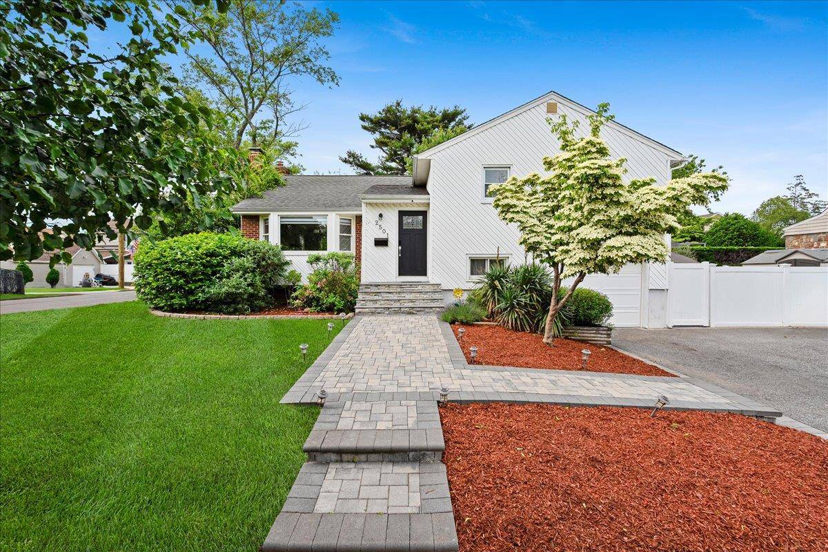 Welcome to Hughes Street, a beautifully updated split level home situated on an oversized 10, 000 square foot lot in the heart of Bellmore.