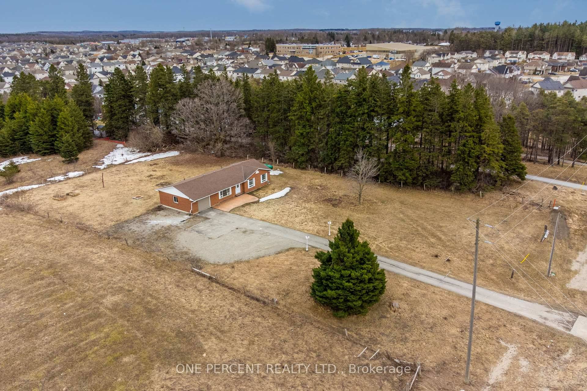 This Recently Updated Bungalow Is The Perfect Blend Of Modern Living And Serene Country Charm.