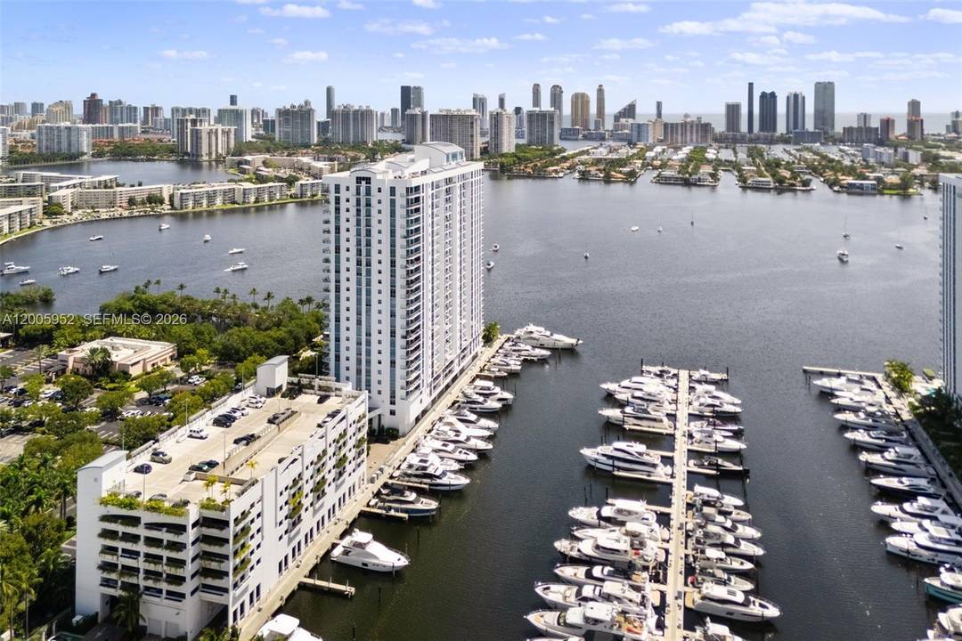 A refined waterfront residence at Marina Palms, offering elevated living with sweeping water views and direct access to a full service marina and yacht club.