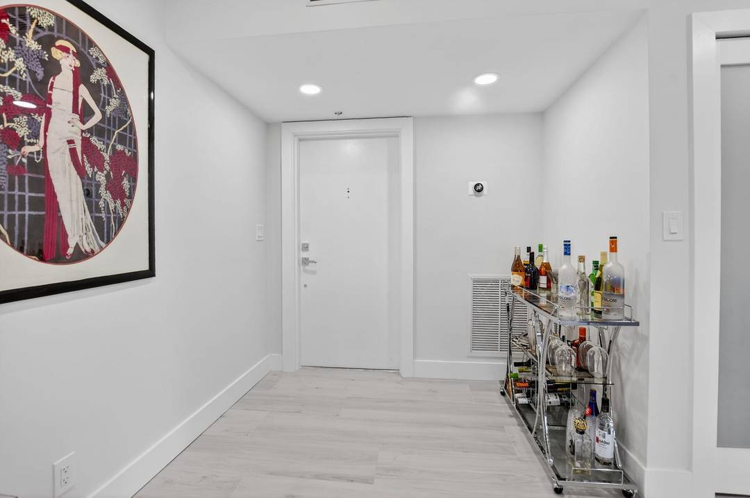 Stunning, turnkey 2 bedroom, 2 bath condo located within the beautifully maintained grounds of Boca West Golf Country Club.