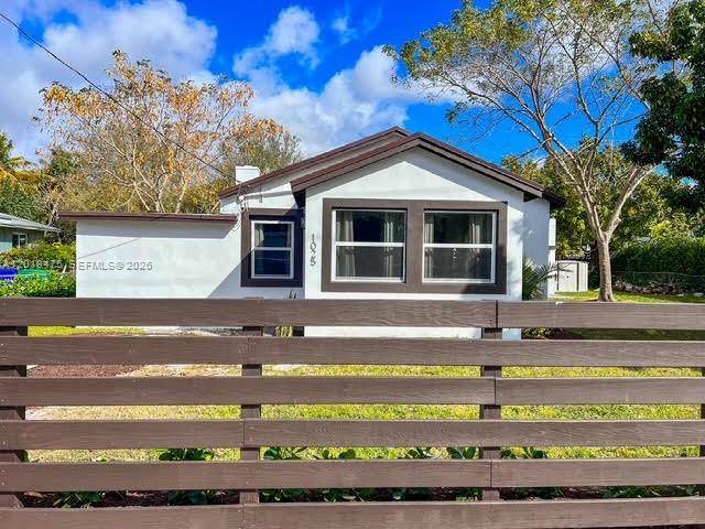 Exceptionally renovated duplex situated on a gated double lot totaling 8, 921 Sq ft, offering outstanding potential for future development or long term income generation.