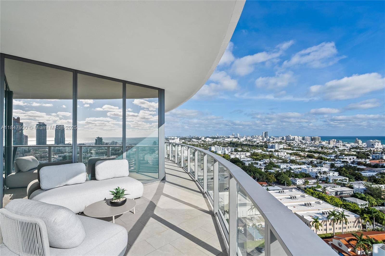 Expansive 4 bed, 5 bath residence offers 3, 521 sq ft of interior space and sweeping South East West exposures for all day sunlight and panoramic views of the Ocean, ...