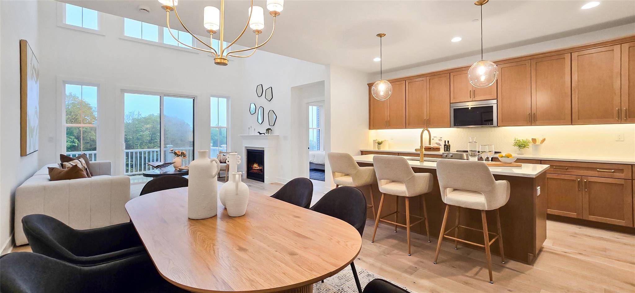 Complementing the well designed kitchen is an immense center island with a breakfast bar as well as plenty of counter and cabinet space, and a sizable walk in pantry.