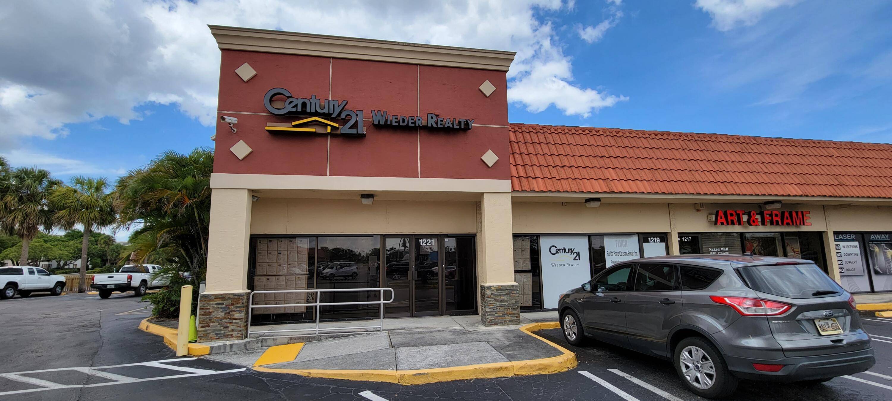 2400 sq foot end cap retail space in high traffic neighborhood center formerly a real estate office.
