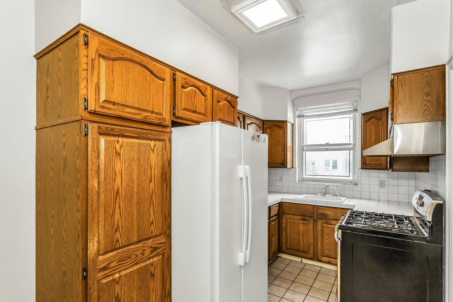 Welcome to this Six 6 Room Attached Brick Townhouse.