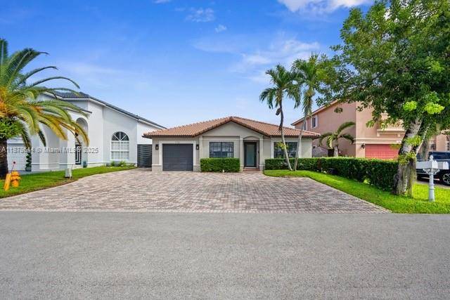 Excellent opportunity ! Completely renovated 3 bedroom, 2 bathroom home with a spacious driveway and a one car garage.