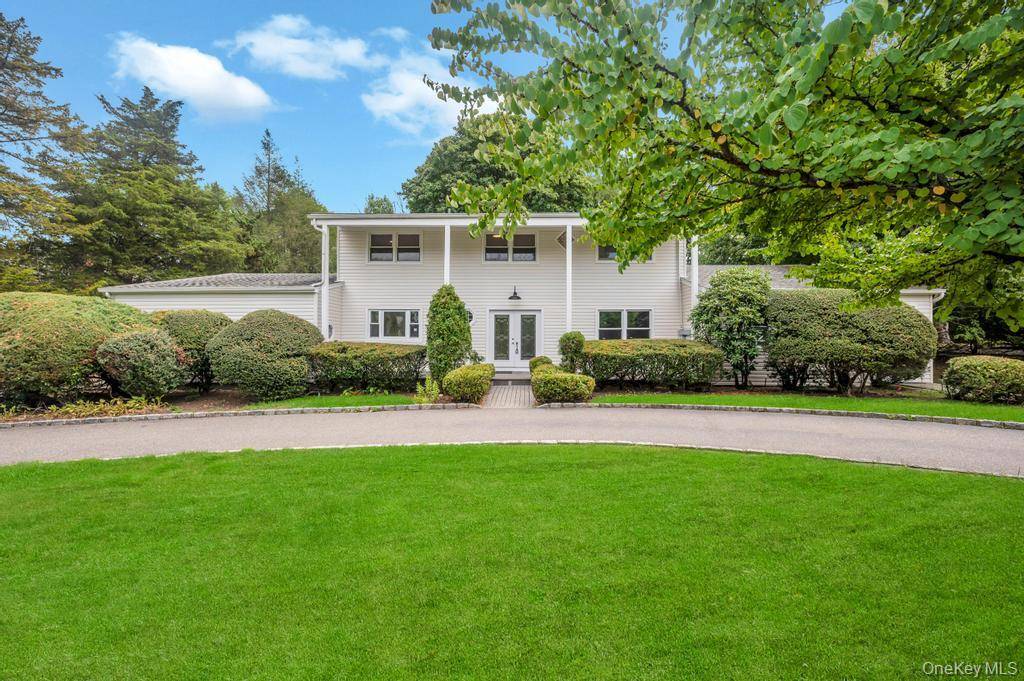 A Spacious Colonial Tucked Away On A Peaceful Cul De Sac and Set On Nearly Half An Acre Of Beautifully Landscaped Grounds With A Circular Driveway, This Exceptional Home Offers ...