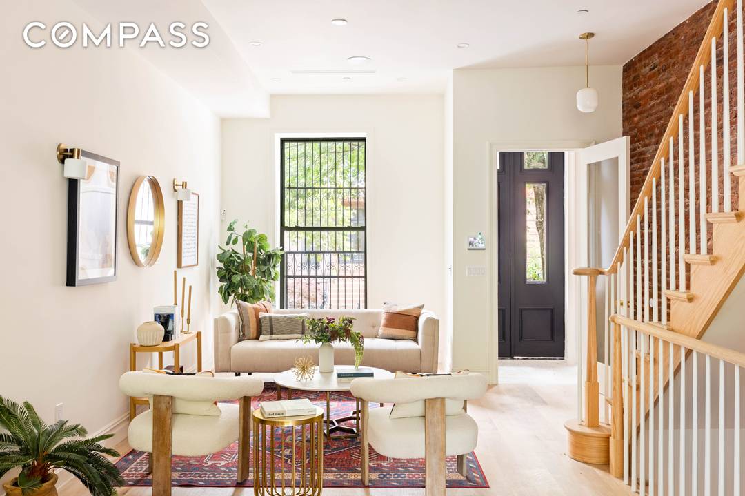 Welcome to 106 Decatur Street, a beautifully renovated 1899 brownstone that masterfully blends timeless elegance with modern sophistication.