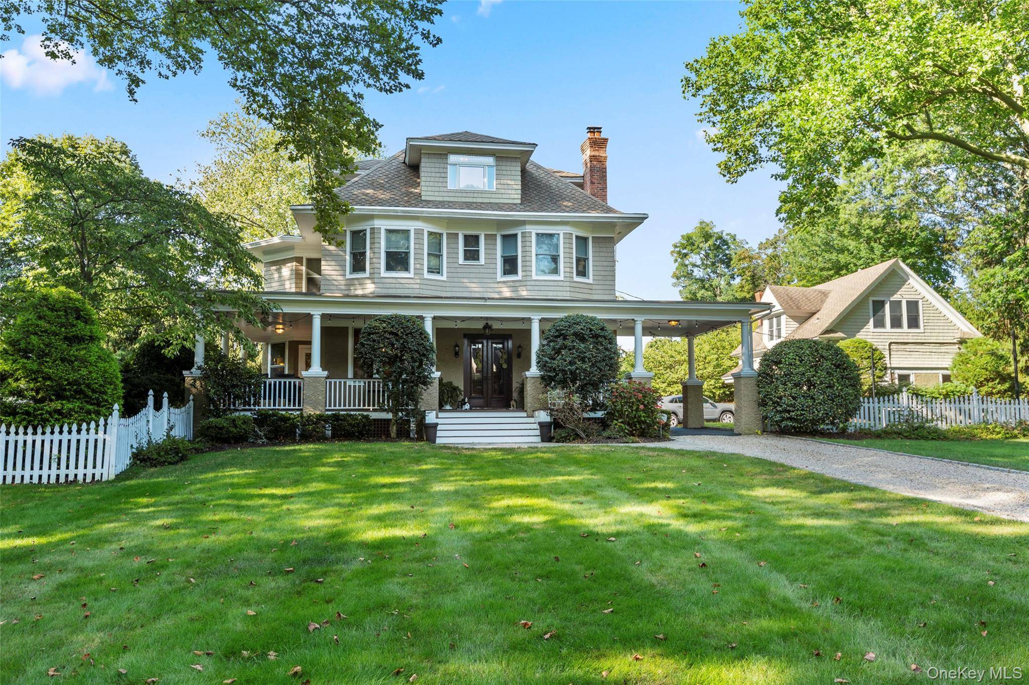 Timeless charm meets modern living in this iconic 1904 Craftsman home in the heart of Stony Brook.
