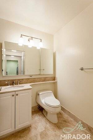 One of the most desirable 1 bedroom layouts at the Caroline with a view of the plush green garden.