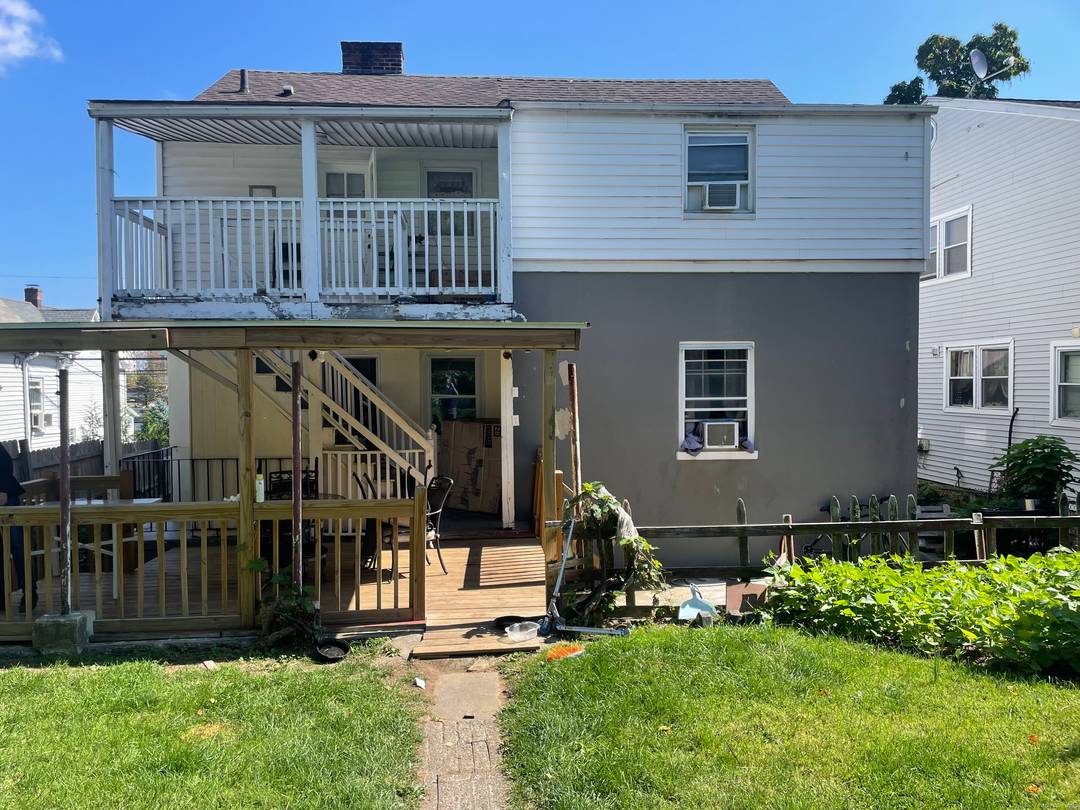 2Family Multifamily in Stamford 1st Unit is middle and bottom floor w attached garage 2 br, 1 bath on middle floor 1 br, 1 bath on bottom floor.