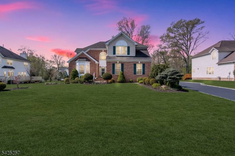 Nestled on a quiet cul de sac in one of Bridgewater's most sought after neighborhoods, this quality built 2002 brick front Colonial offers 5 bedrooms and 2.