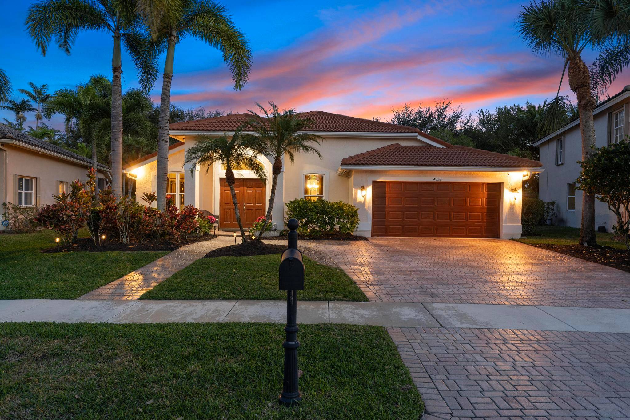 Nestled in the highly sought after guard gated community of Isles at Wellington, this home offers a 3 way split floor plan, ideal for accommodating any family's needs.