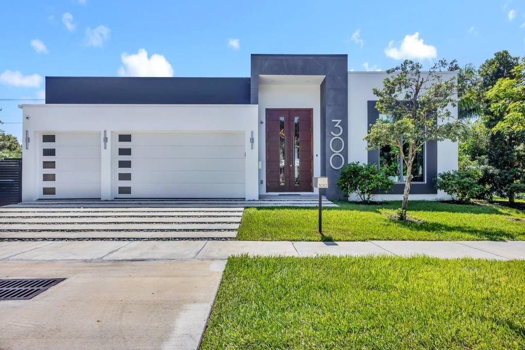 NOW AVAILABLE ! Walk to Wilton Drive from this modern masterpiece on a corner lot in trendy Wilton Manors.
