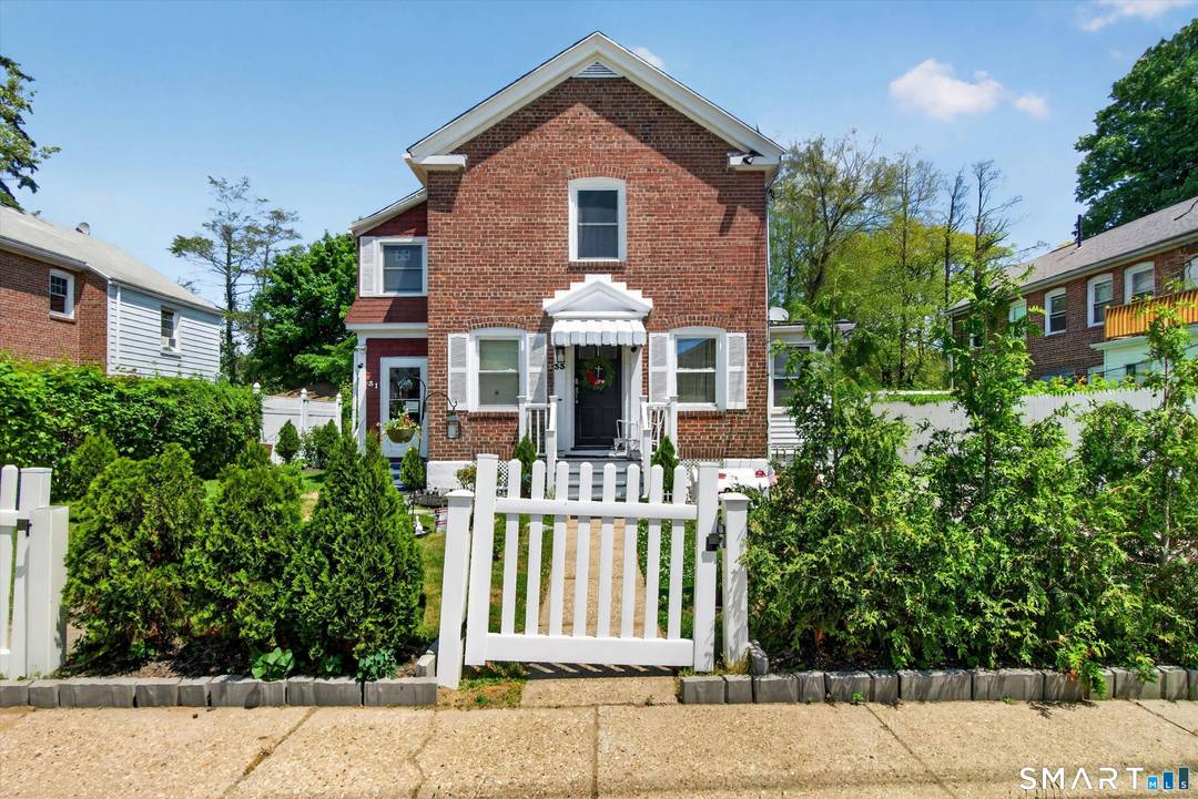 Don't miss this solid brick detached 2 family home in Bridgeport's desirable North End !