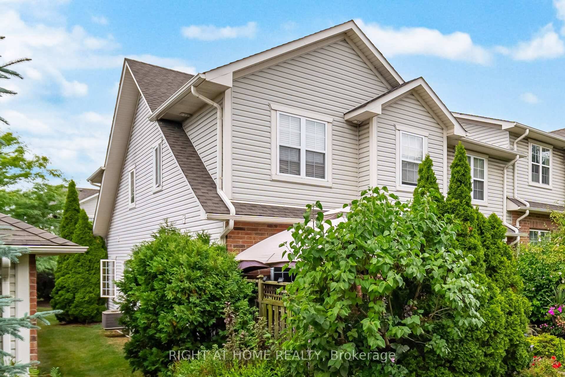 Welcome to this stunning 2 bedroom, 4 bathroom townhome in the highly desirable Meadowcreek Village in Ancaster.