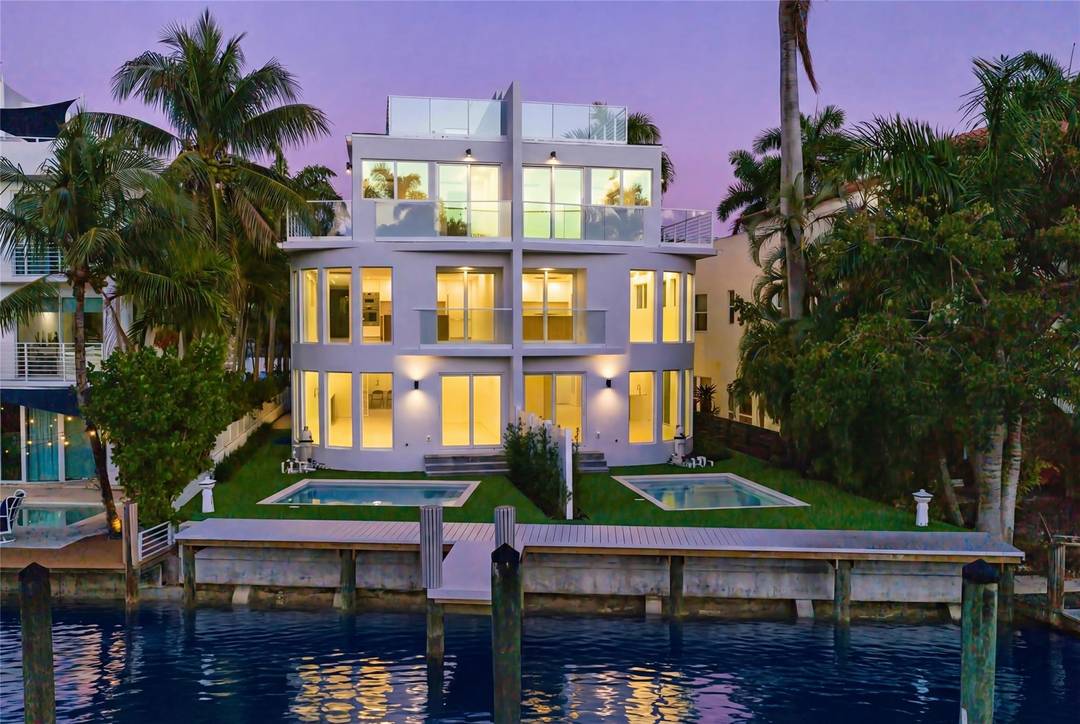 New Modern 3 level deepwater townhome South sited on the Karen Canal off prestigious Las Olas Blvd in the Venice of America.