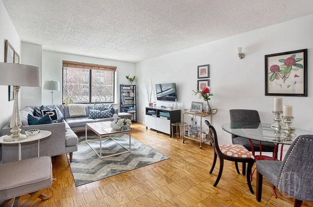 A wonderful place to call home, this spacious one bedroom apartment has a pass through kitchen, large living room, king sized bedroom, marble bathroom, and three closets throughout.