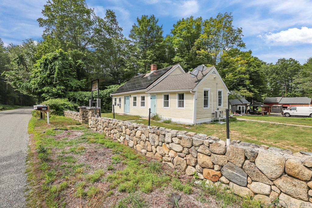 Set on nearly 3 acres in a quiet Killingly location, this charming 4 bedroom, 2 bath mini farm blends country character with modern upgrades.