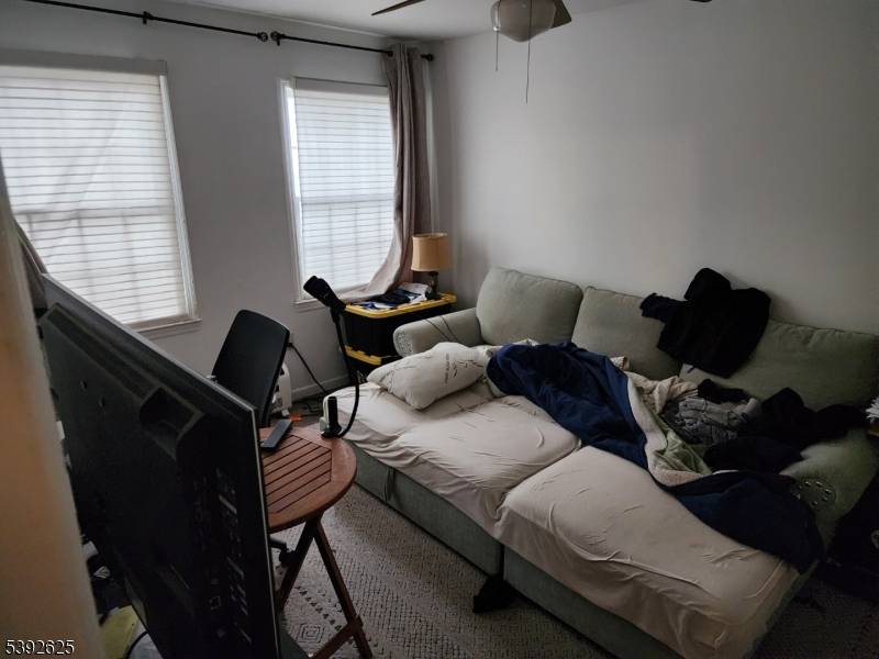 FIRST FLOOR CONDO W CENTRAL AIR, FIREPLACE, MASTER BATH W JACUZZI TUB.