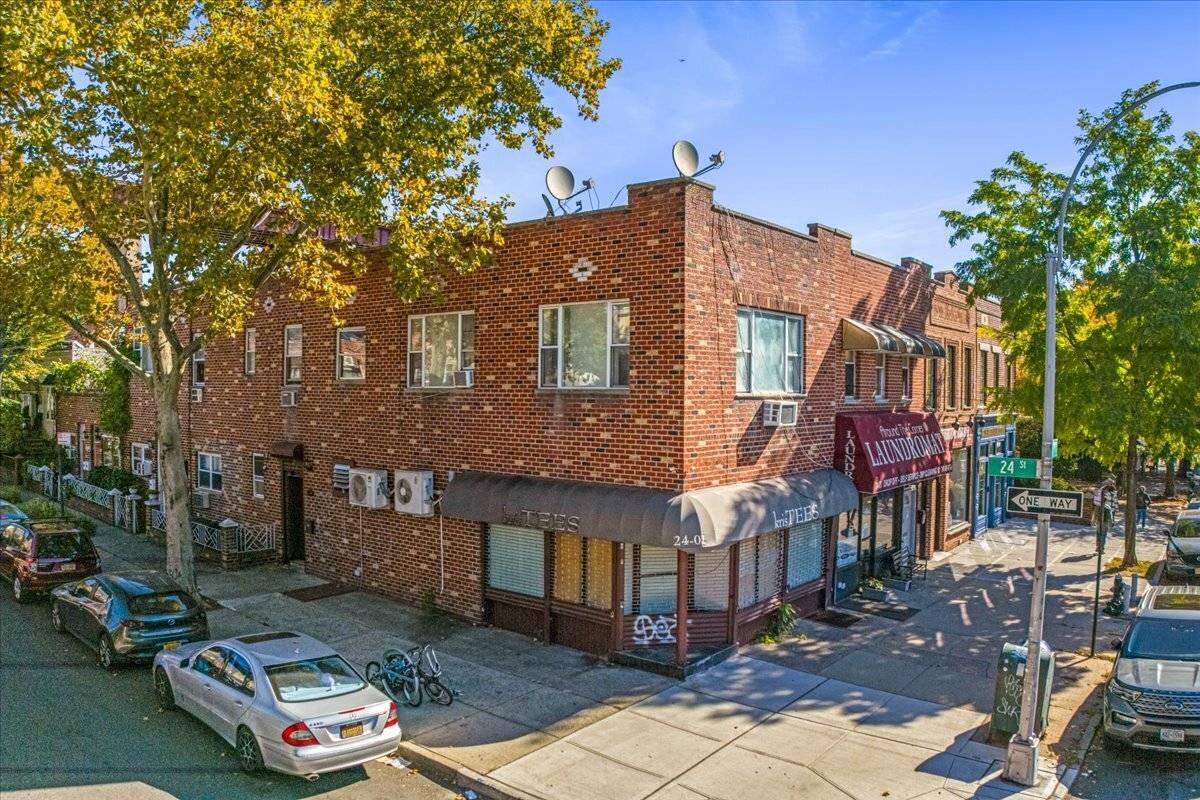 This mixed use property features a street level commercial space, ideal for small retail store, cafe' or office.