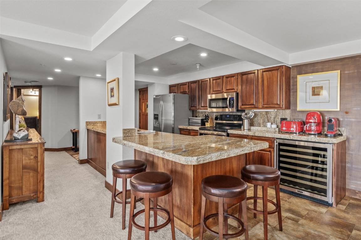 This slopeside condo offers a prime opportunity for those seeking a ski in ski out home boasting unparalleled views of the slopes of Steamboat, the base area, and South Valley.
