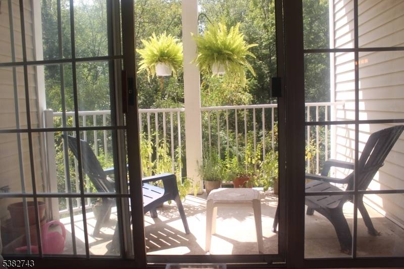 Beautifully maintained 2BR 2BA condo featuring hardwood floors, newer appliances, granite kitchen, and updated light fixtures.