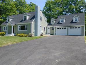 Beautifully refreshed home with an added 800 sf making for a huge kitchen with 9' island.
