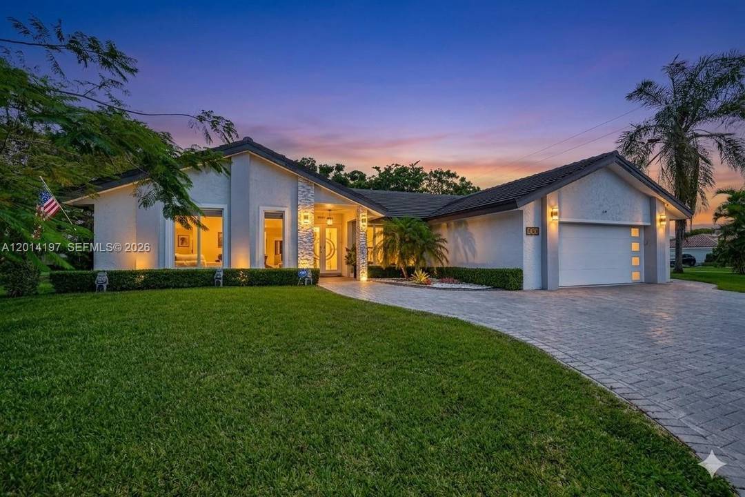 Exceptional residence in Deer Creek Golf Estates offering upscale South Florida living WITHOUT MANDATORY MEMBERSHIP FEES !