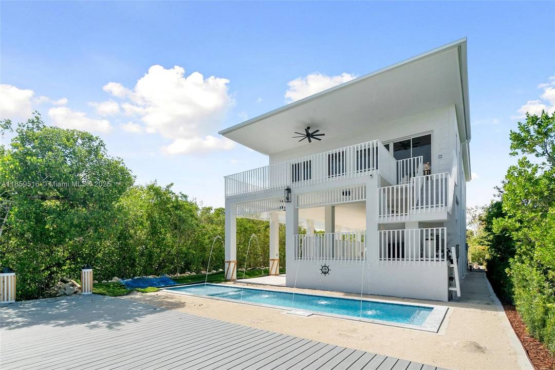 Experience Elevated Coastal Living Brand New Oceanside Pool Home with Dock in Key Largo Welcome to your dream waterfront retreat in Key Largo !