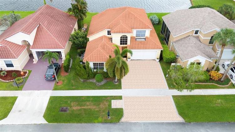 Home for rent in Highly Sought After Boca Landings, This beautifully maintained 4 bedroom, 2.
