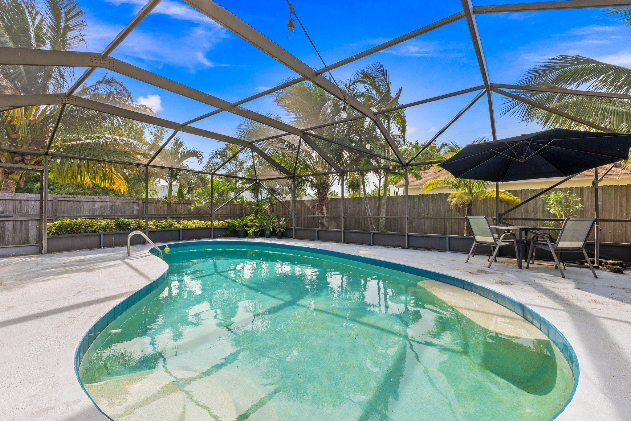 Welcome to your 4 bedroom, 2 bath, concrete block pool home, perfectly situated on a corner lot.