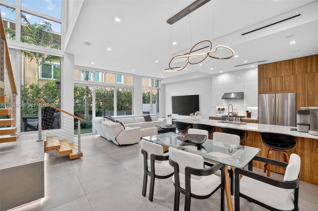 Impeccably maintained modern townhome located in a boutique, eight unit Victoria Park community.