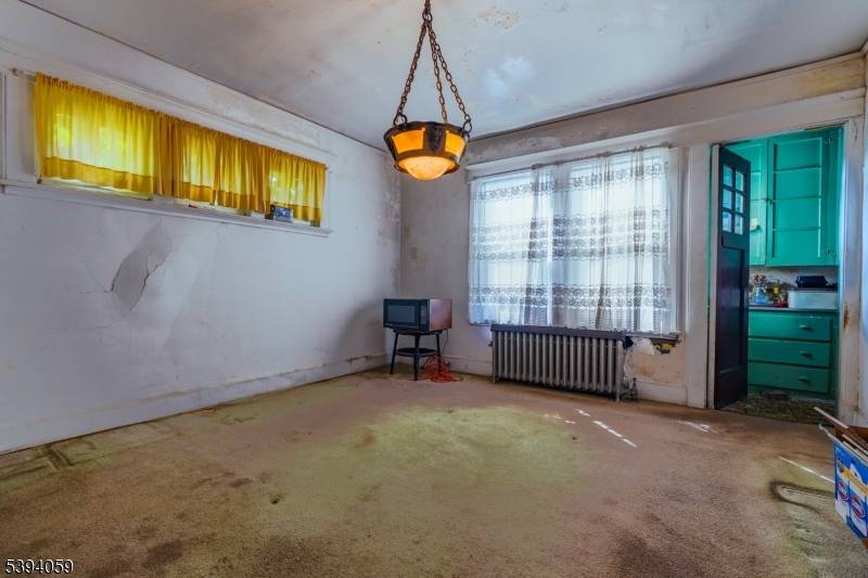 Opportunity awaits ! This spacious property is ready for renovation and offers a blank canvas for your vision.