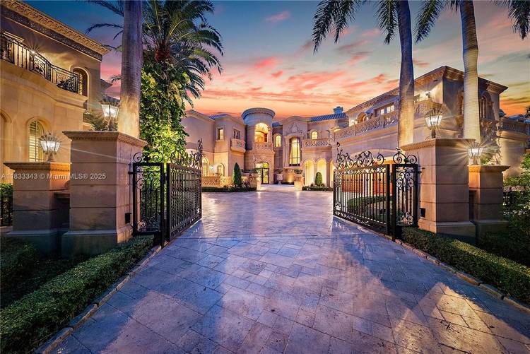 Introducing a palatial waterfront estate on a double lot in the exclusive community of Admirals Cove, where timeless design meets South Florida luxury.