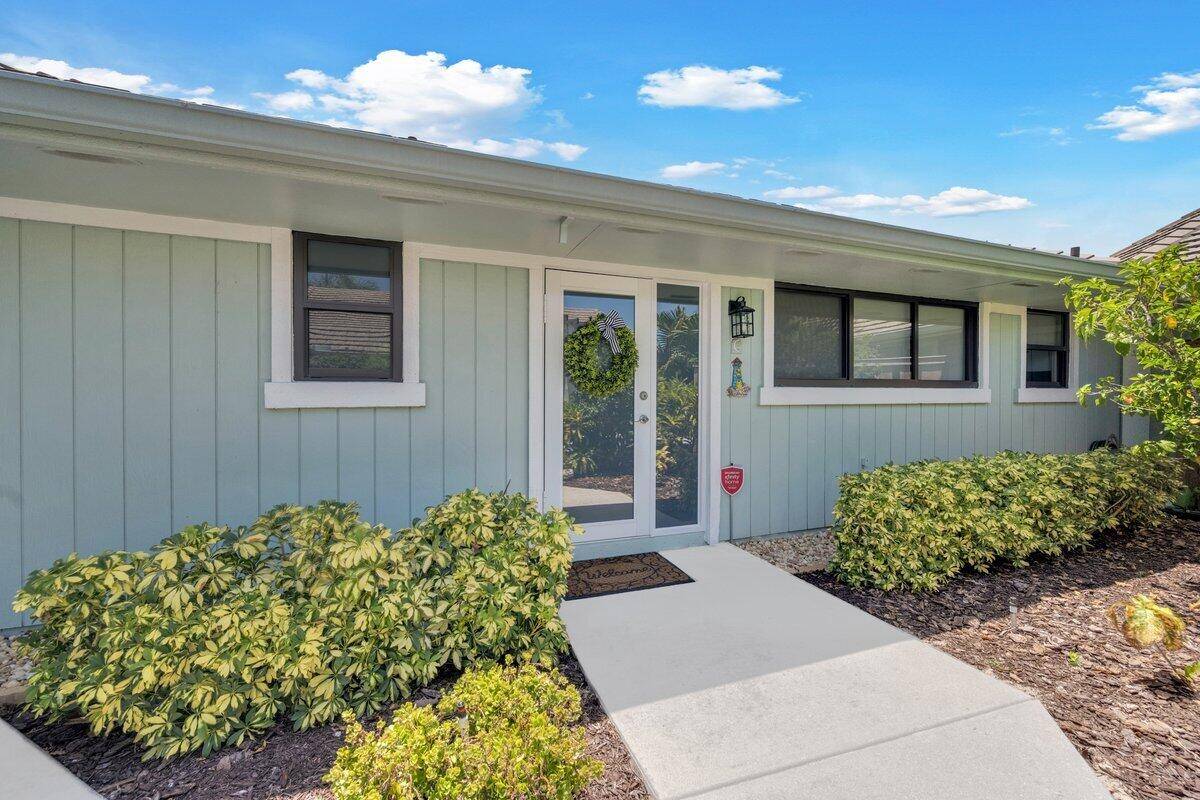Live the Jupiter Dream ! Enjoy sunrise beach walks from this elegantly redesigned 2BR 2BA beachside villa one of the finest in Bella Vista !