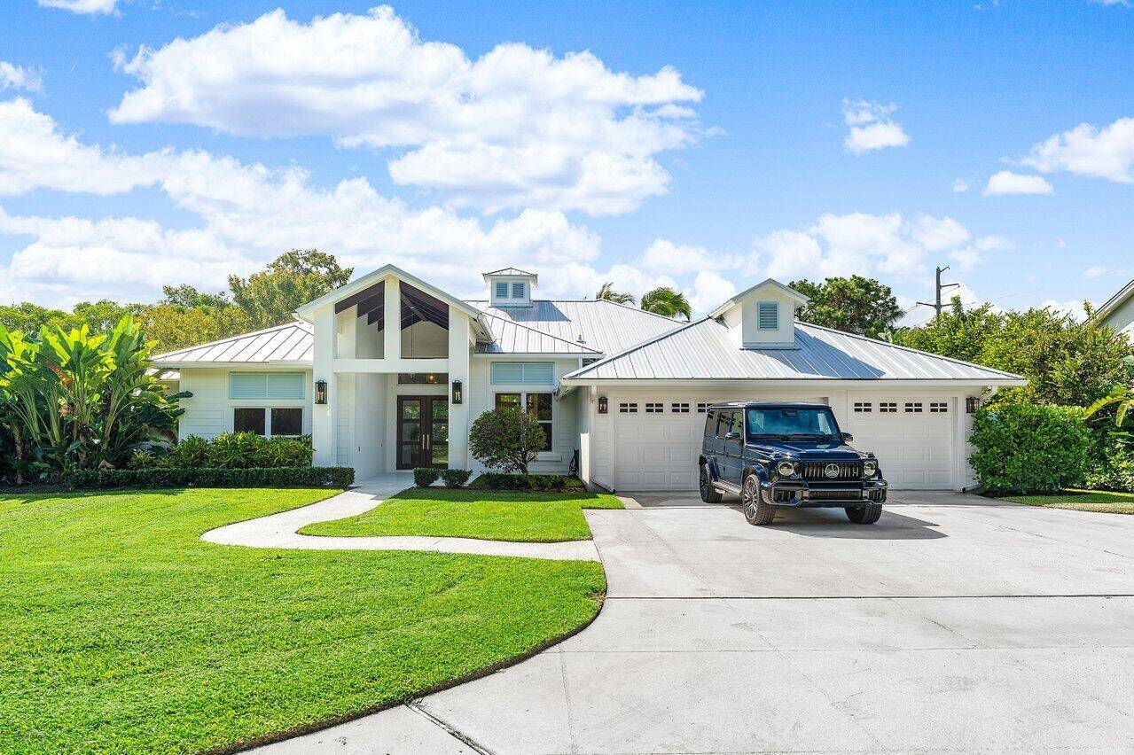 Welcome to 5980 Our Robbies Road, Jupiter a rare, extraordinary estate located in one of the most exclusive and discreet enclaves in all of Palm Beach County.