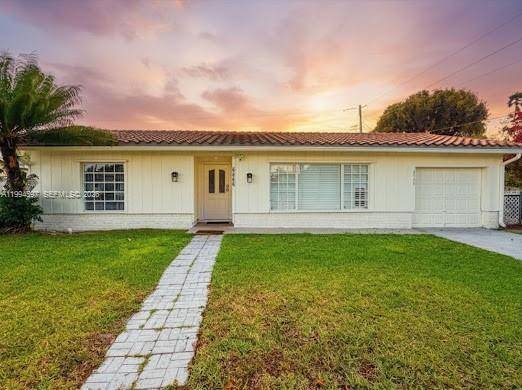 Two master bedrooms, 4 Bedrooms total and 3 Full Bathrooms with garage, Pool and RV Parking.