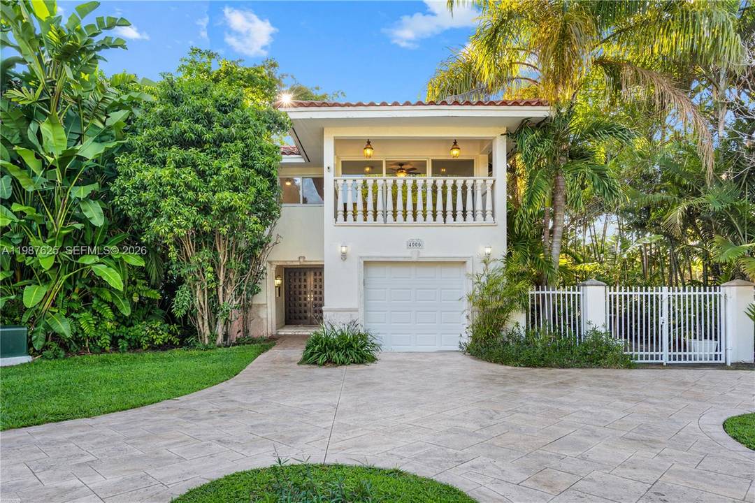 Bright amp ; spacious 2 story home on a desirable corner lot in the heart of Coral Gables, located on prestigious Alhambra Circle.
