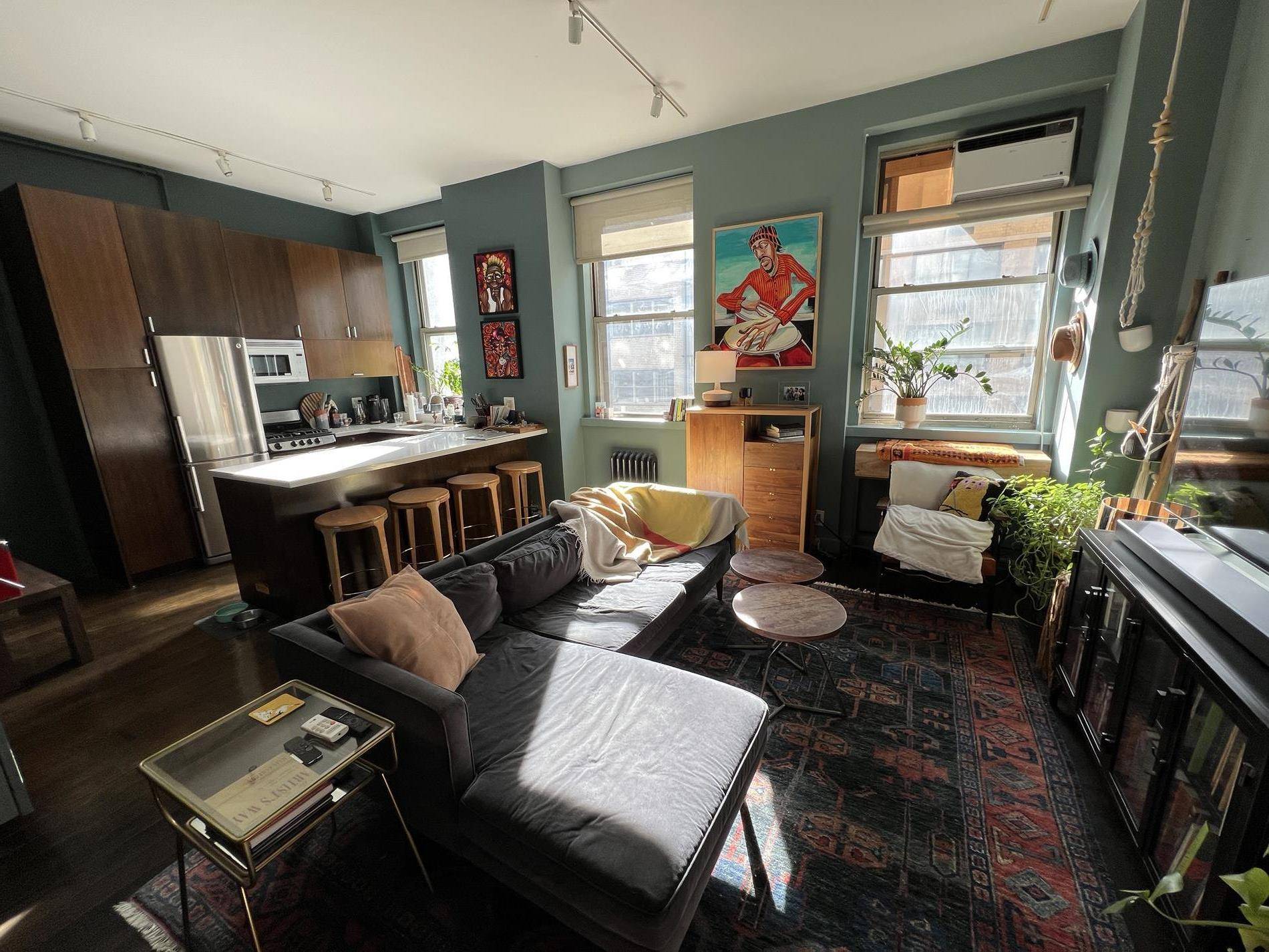 This meticulously renovated loft is a true gem in the city.