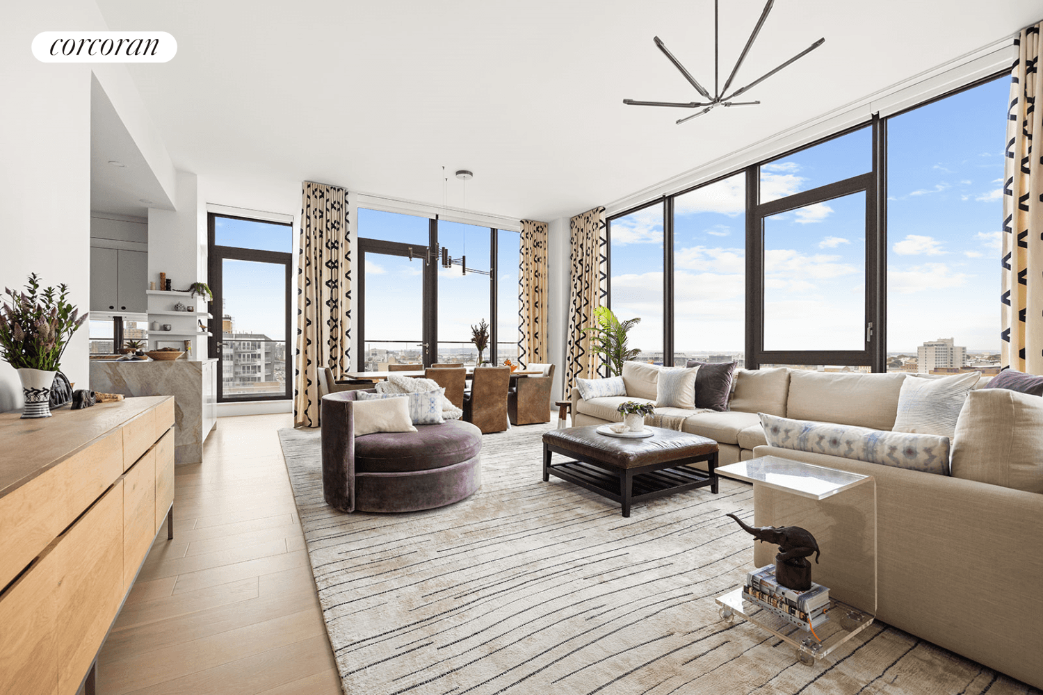 Experience luxurious top floor living with breathtaking 360 degree views from floor to ceiling windows in this expansive 4 bedroom, 3 bathroom home, situated in the heart of Park Slope.