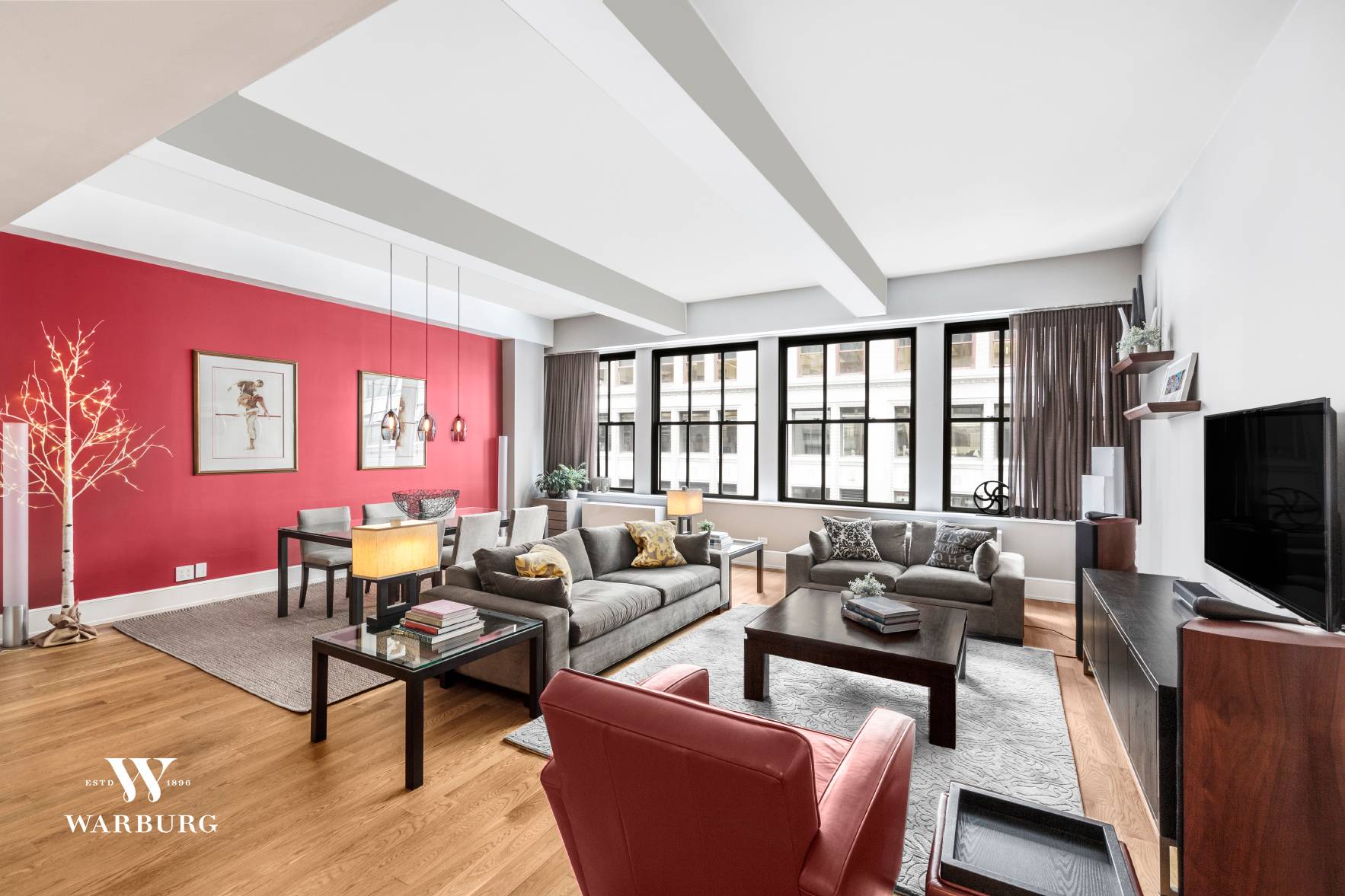Spectacular sun flooded, corner apartment with soaring 11 foot ceilings.