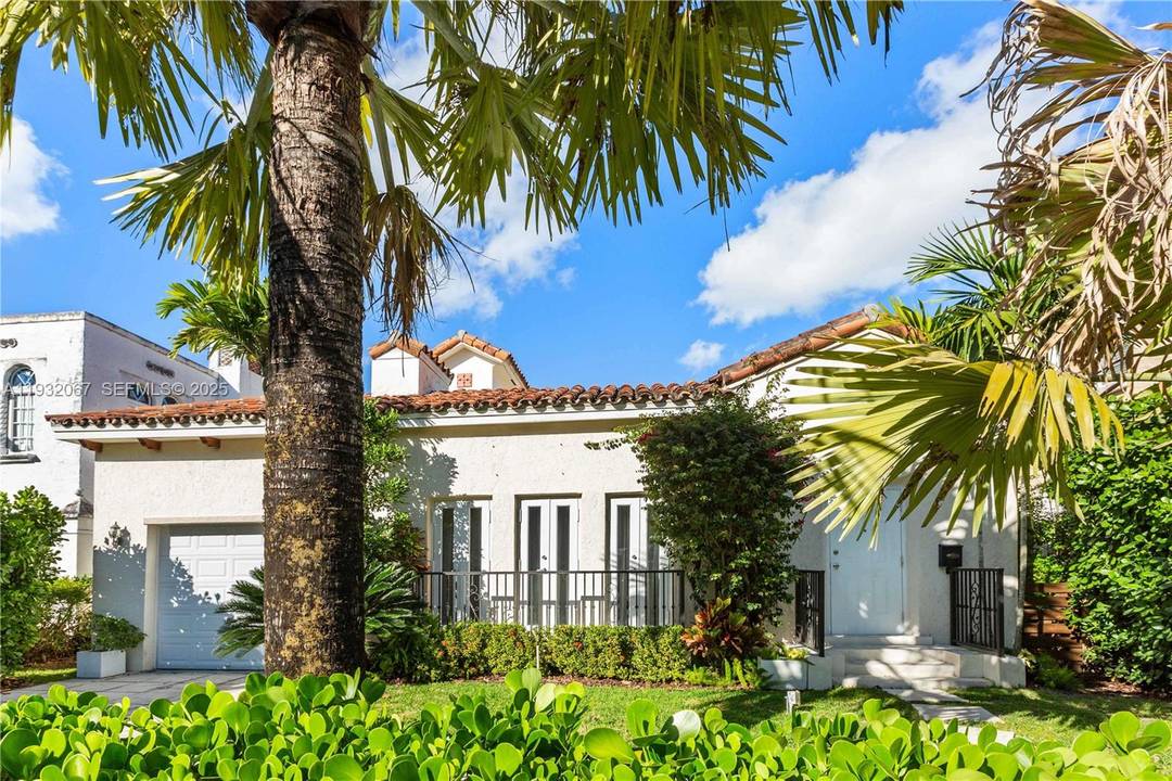 Exceptional 1925 Gables Spanish that offers ample space and a touch of modern.
