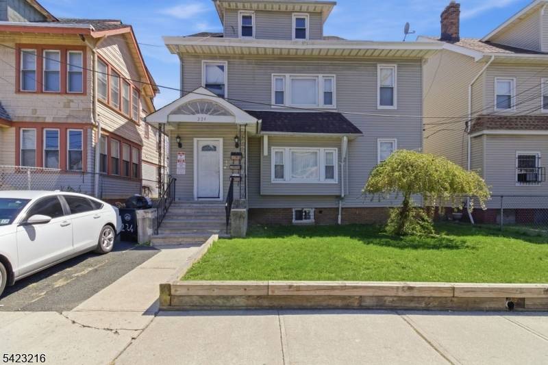 A rare find ! Stunning and well maintained three family home with inviting curb appeal, ideally situated on a quiet residential street.