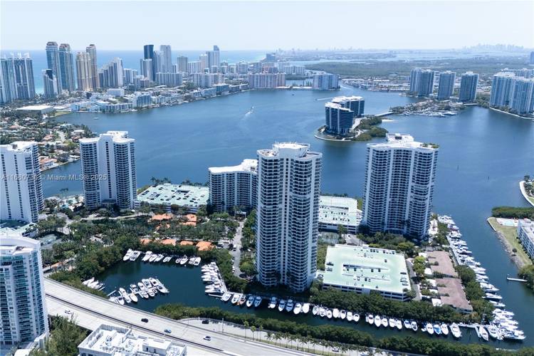 Mystic Pointe 2 Beds, 2 Baths unit with beautiful views of the intracoastal, golf course, SUNSET.