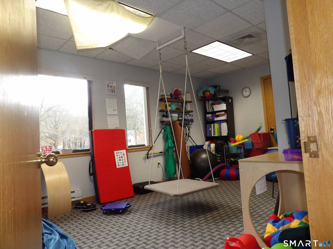 A well maintained office building on second floor in office complex.