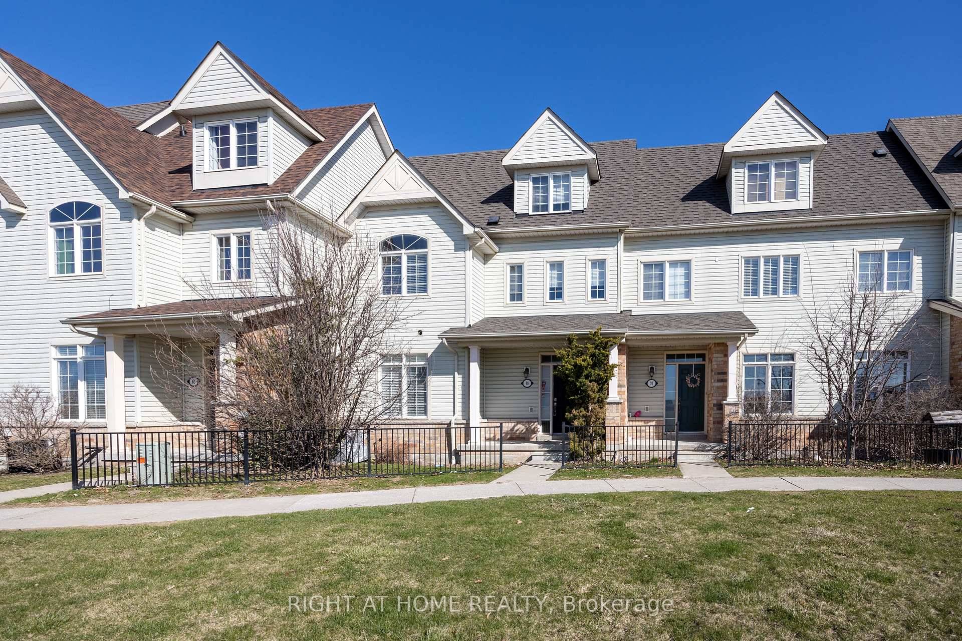 Welcome Home ! This executive townhome has so much more than meets the eye !