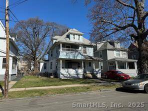 Discover the investment potential of this elegant two family home at 141 Center Street in West Haven.