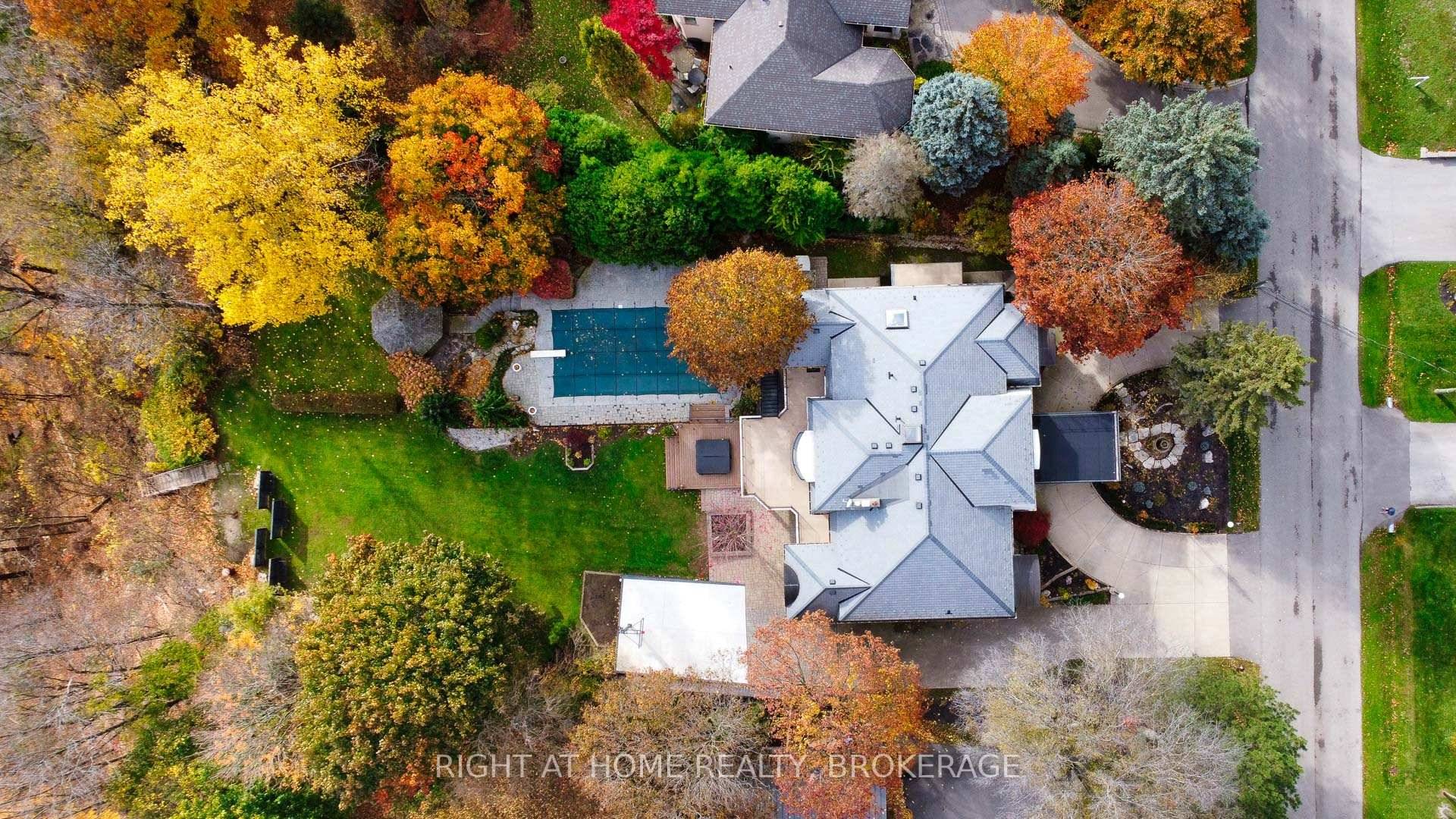 This stunning home is a true escape from city living, offering over 6, 000 square feet of luxurious living space on an oversized escarpment lot.