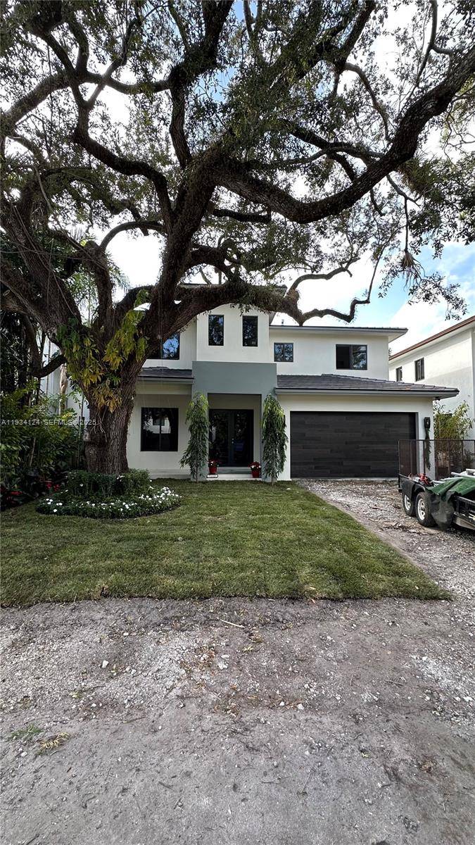 Exceptional residence ideally positioned just minutes from South Miami, offering a seamless blend of timeless design and modern functionality, with convenient proximity to shopping and schools.